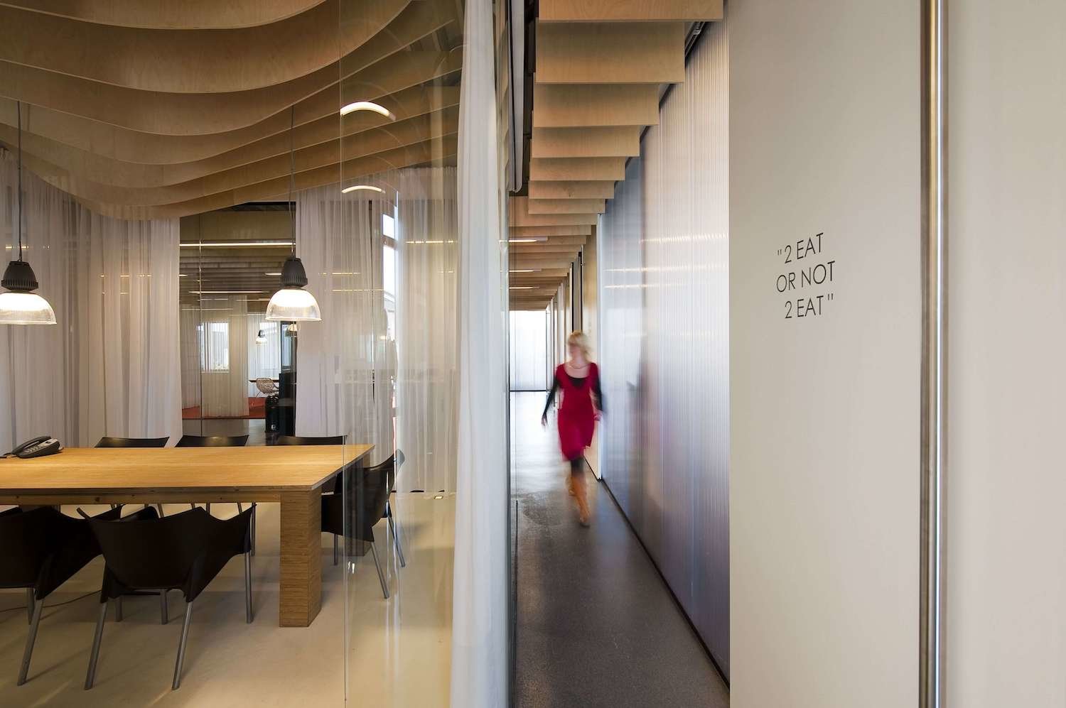 First floor, glass meeting room, and wood lamellae ceiling. First floor, glass meeting room, and wood lamellae ceiling.